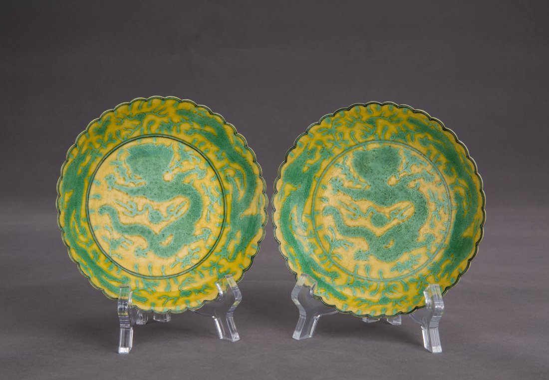 A PAIR OF YELLOW AND GREEN-GLAZED SCALLOP-RIMMED DRAGON (1 of 4)