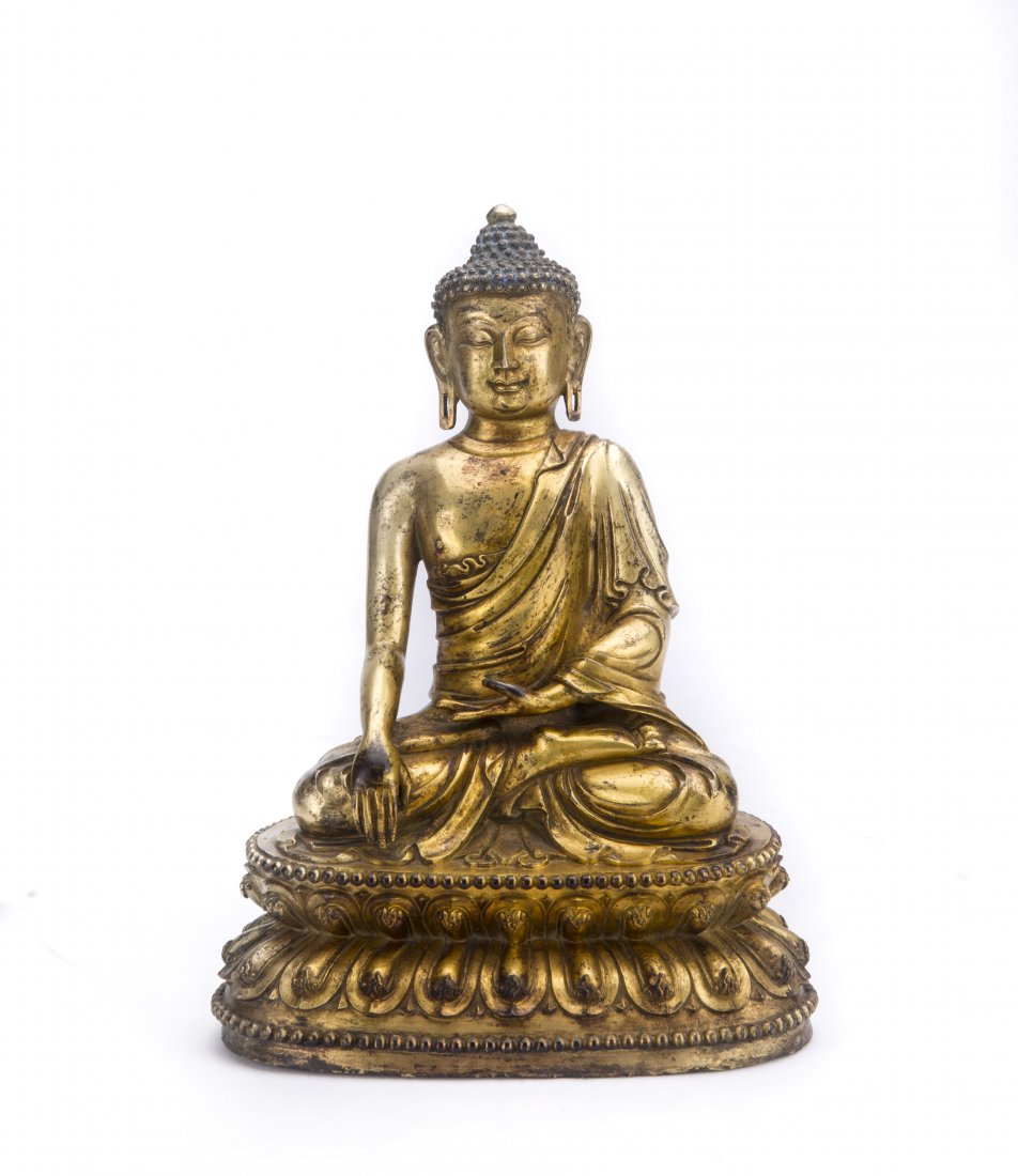 A GILT-BRONZE FIGURE OF SAKYAMUNI (1 of 4)