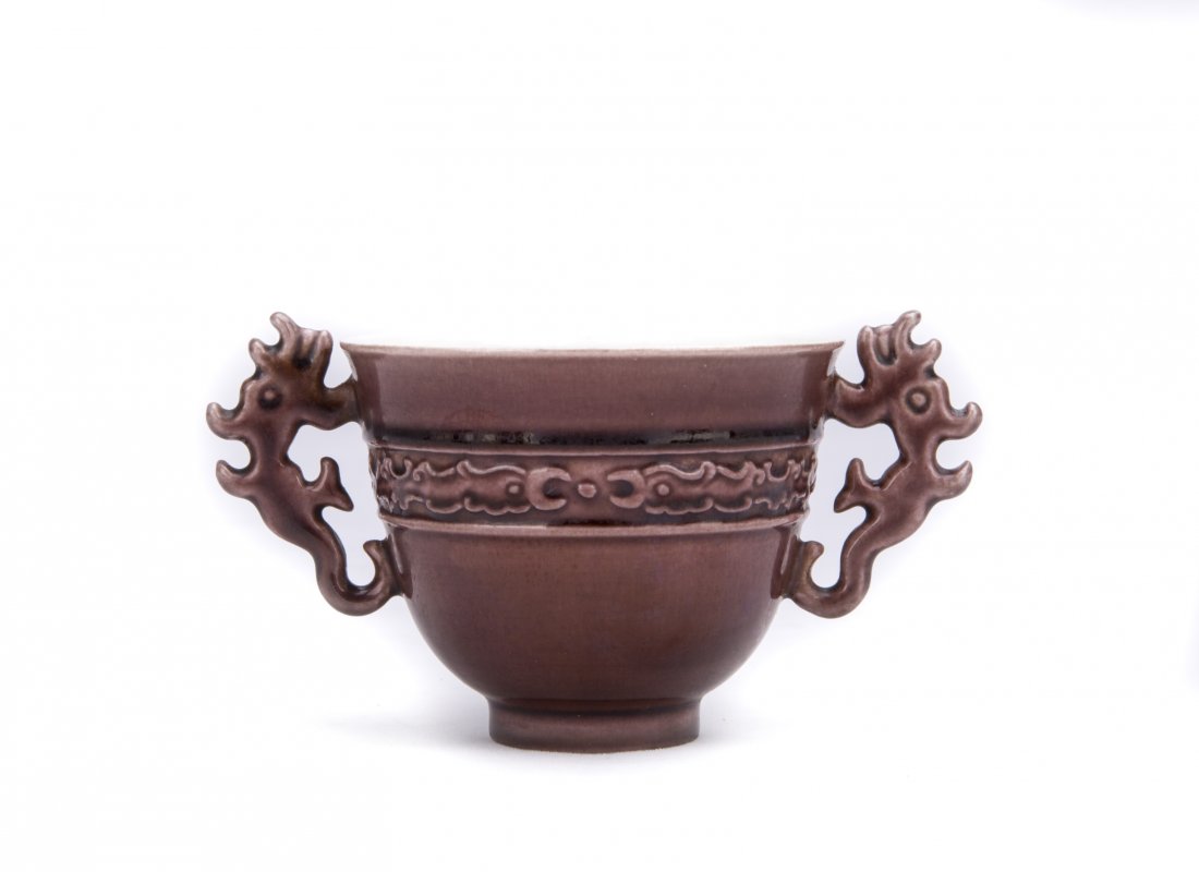 A PURPLE GLAZED TWIN HANDLED CUP (1 of 4)