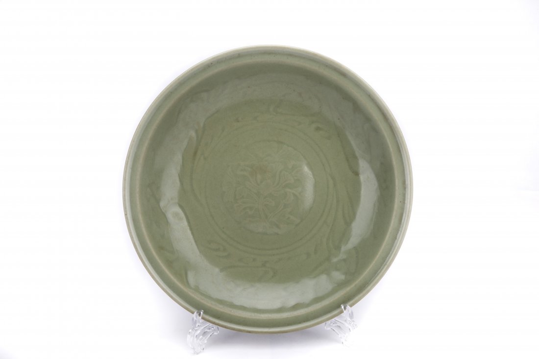 A CARVED CELADON GLAZED DISH (1 of 3)