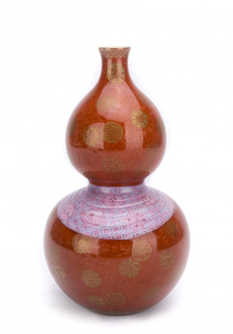 AN IRON-RED GROUND FAMILLE ROSE DOUBLE GOURD VASE (1 of 5)