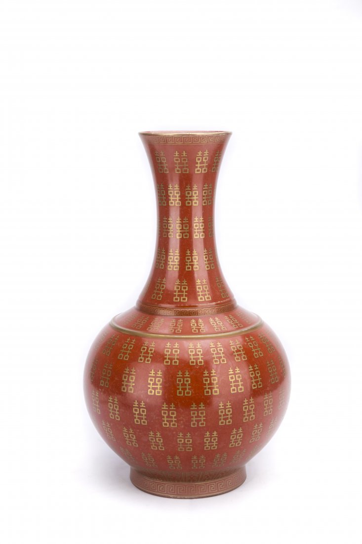 A CORAL-GROUND GILT-DECORATED BOTTLE VASE (1 of 4)
