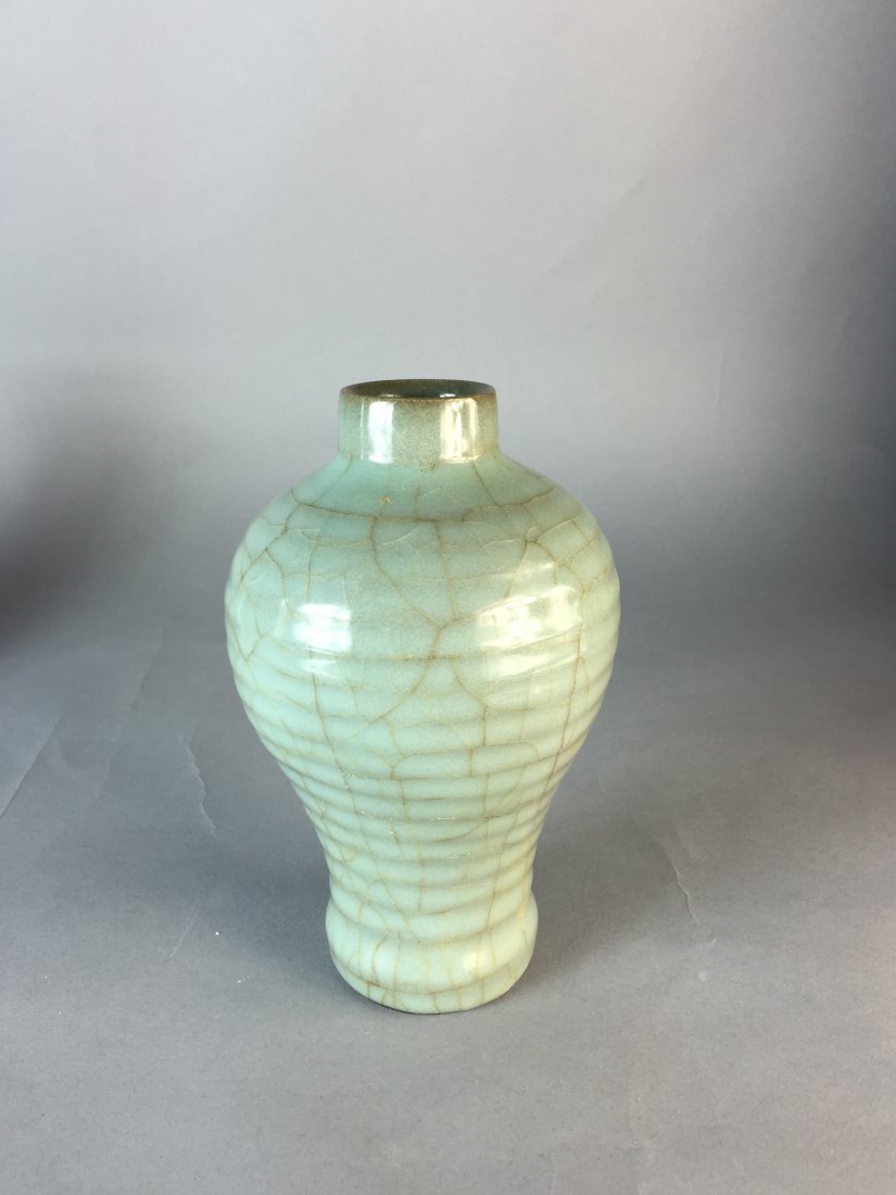 A CELADON PORCELAIN VASE (1 of 7)