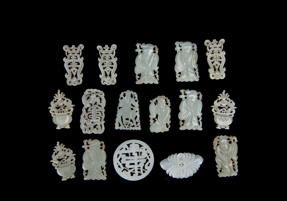 A GROUP OF SIXTEEN CHINESE JADE PLAQUES AND PENDANTS (1 of 7)