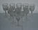 17: Eleven colorless cut crystal wine glasses