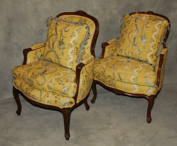 Pair of 19th c. Louis XV style carved mahogany: Pair of 19th c. Louis XV style carved mahogany bergeres. H: 35 5" W: 27" D: 29"