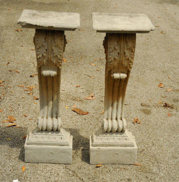 Pair of cast stone garden pedestals. H: 38" W: 12.5" D: (1 of 2)