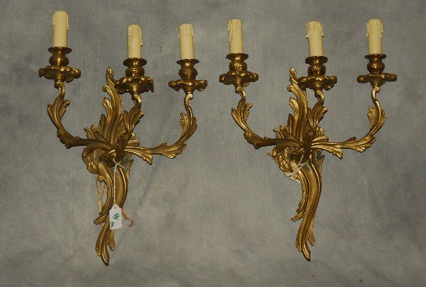 Pair of Louis XV style bronze 3-light sconces. H: 16.5" (1 of 1)