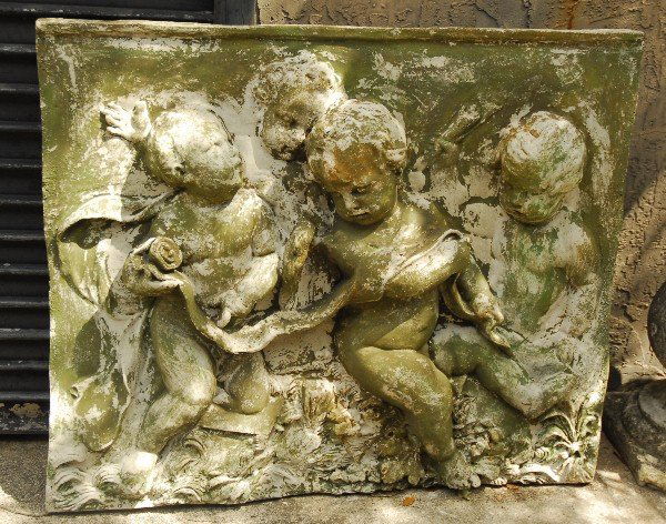 Large cast stone putti plaque with traces of paint. H: (1 of 2)