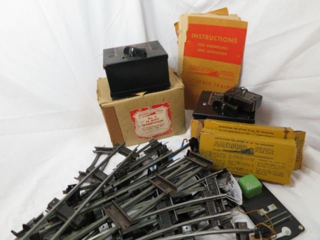 American Flyer Lot - No. 2 & No. 2B Transformer: (box with No. 2), and 17 Pieces of Track (3/16 - 13 Curved and 4 Straight), Two No. 706 Uncouplers with boxes, book and one control button.