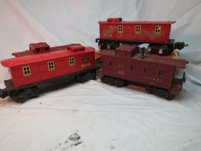 Four Pc. Lot - Lionel 2682 Caboose, 1682 Caboose,: 6357 Caboose, and 6257 Caboose (6257 has original rough box)