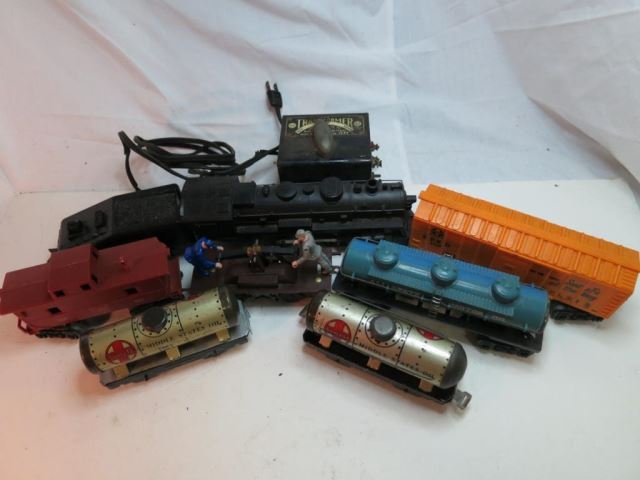 Marx Train Pieces in Box with Engine, Tender,: Transformer, Tanker, Caboose, and a Box Car