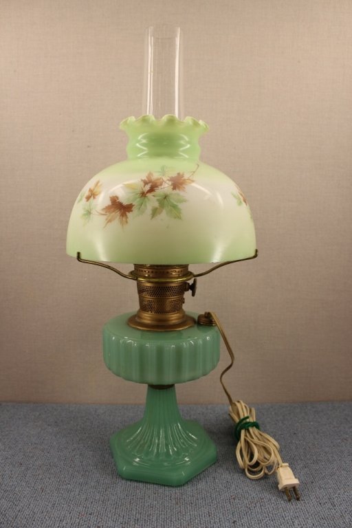Converted Aladdin Model B Jadite Oil Lamp: Converted to electric from kerosene. Mantle Lamp Co, Chicago, Aladdin with Model B Nu-Type burner. Made between 1935-1948. Has a 12 inch glass screw on chimney. Ribbed jadeite green font. Transfer pri