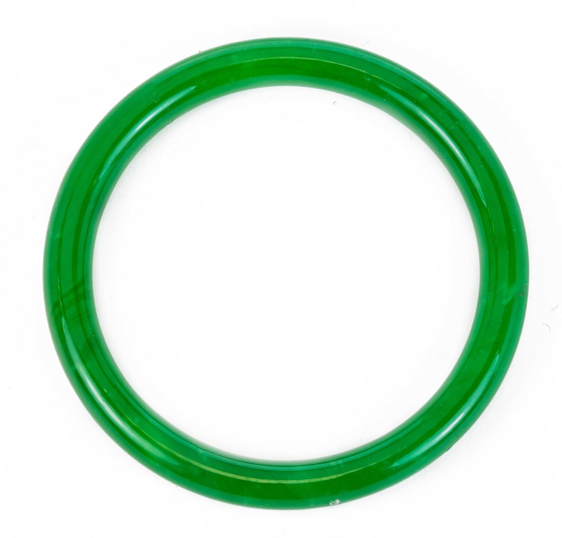 A CARVED JADEITE BANGLE (1 of 2)