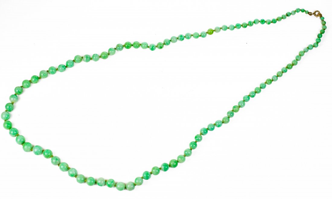 A JADEITE BEAD NECKLACE (1 of 2)