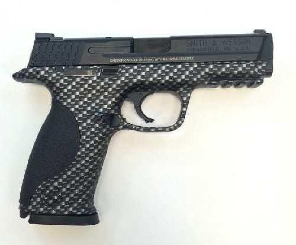 NEW!!! SMITH AND WESSON M&P9 9MM 022188865776: FAMILY:M&P Series MODEL:M&P9 TYPE:Semi-Auto Pistol ACTION:Double Action Only FINISH:Carbon Fiber STOCK/FRAME:Polymer Frame STOCK/GRIPS:Polymer CALIBER/GAUGE:9mm CAPACITY:17+1 # OF MAGS:2 MAGAZINE DESC