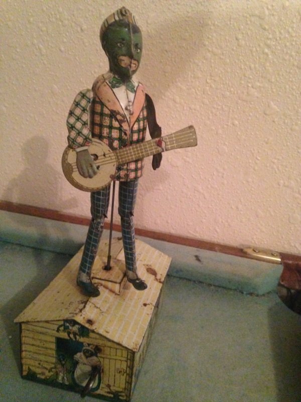 vintagae Jazzbo on the roof wind-up toy: Nice condition jazzbo on the roof wind-up toy still works perfect .