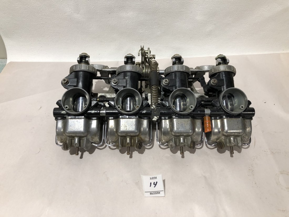 Honda 750 Quad Kei Hin Motorcycle Carburetor Assembly: Set of four Kei Hin Japan carburetors as a complete assembly for a motorcycle. Fits Honda CB750 four.