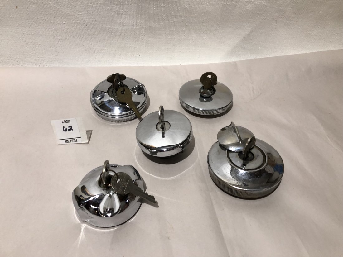 Ford Chevrolet Gas Caps Chrome Locking Gas Caps with Keys: Lot of Five Misc. Chrome Locking Gas Caps with Keys. Three of them have 2 keys, while the other two only have one.