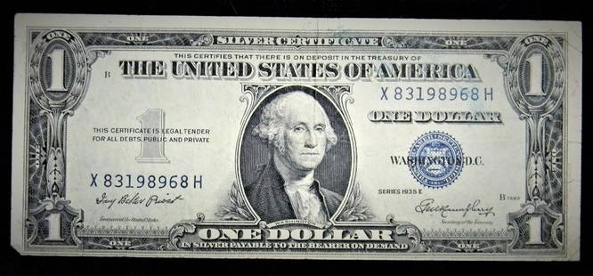 Nice Series 1935 E $1 Blue Seal Silver Certificate: Nice Crisp Series 1935 E $1 Silver Certificate Obv. Portrait George Washington 1st president of US. Rev Design Great Seal of the US. S/N X83198968H Obv. Plate B7680 Rev. 5955 This Series was issued w/