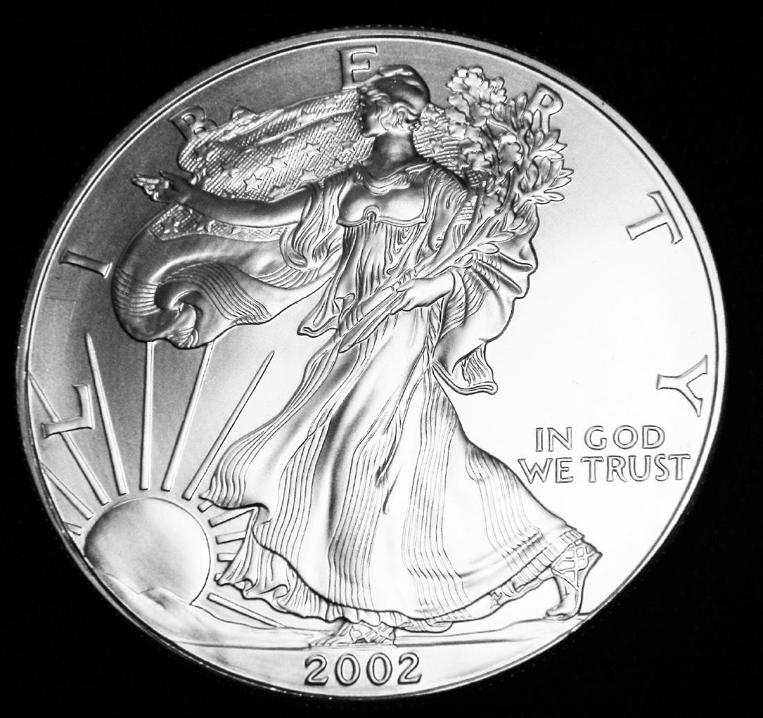 1900-O Morgan Silver Dollar, Brilliant Uncirculated (1 of 2)