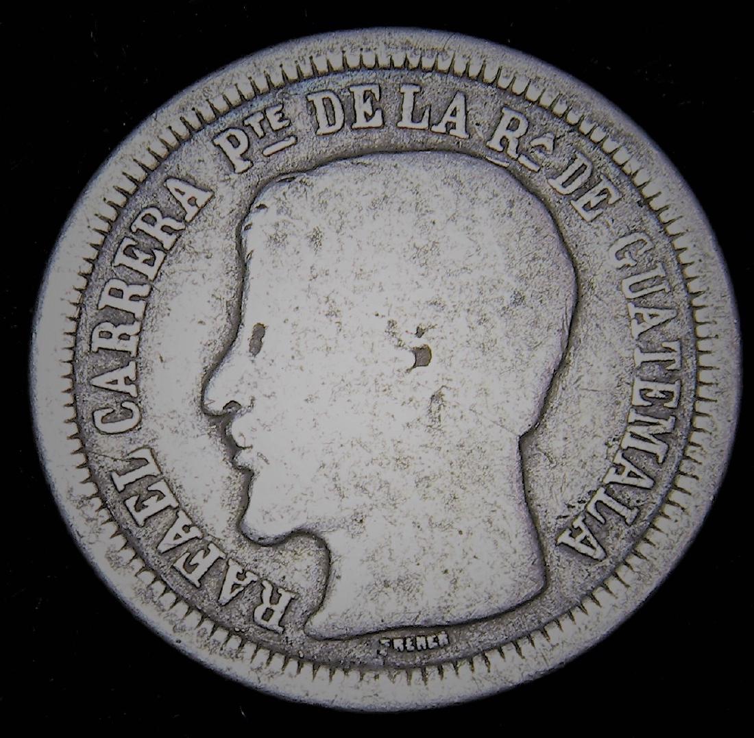 1863 R Guatamala 2 Reales Rafael Carrera Scarce Coin: 1863 R Guatamala 2 Reales Rafael Carrera Scarce Coin : Obverse Bust FACING left, with legend around and engraver's name at neck's base. Lettering: RAFAEL CARRERA PTE DE LA RA DE GUATEMALA FRENER F. Tr