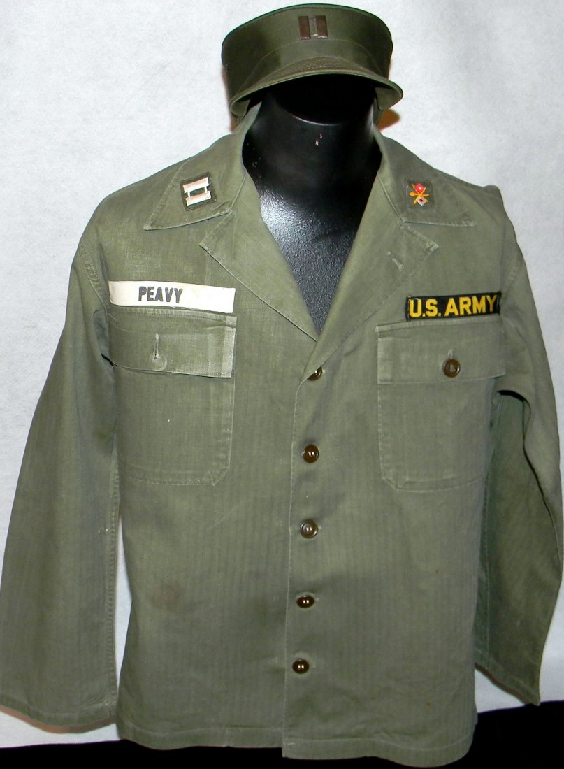 Korean War Era Captain's OD Green Uniform 48th Armor: Sterling Silver insignia on cap. Includes: Blouse, Trousers, and Field Cap. This Item is in excellent condition and still starched from the 1950's.