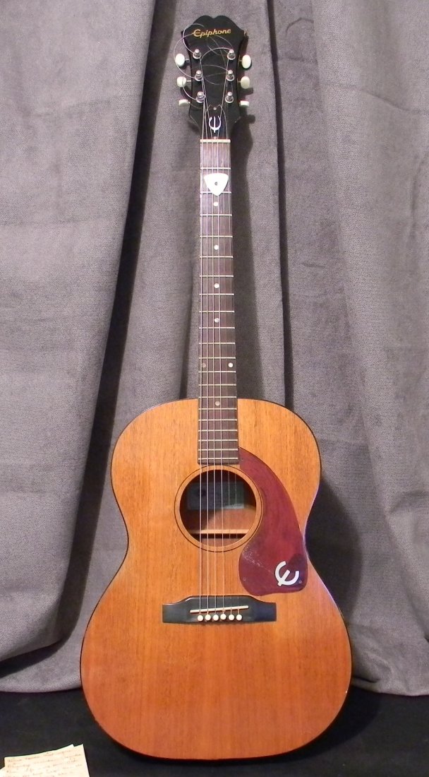 Original 1964 American-made Ephiphone Caballero Guitar: One of the oldest guitars the company made, the 1964 Epiphone Caballero FT30 Acoustic Guitar is very collectible. It has the blue, union made sticker and original case.