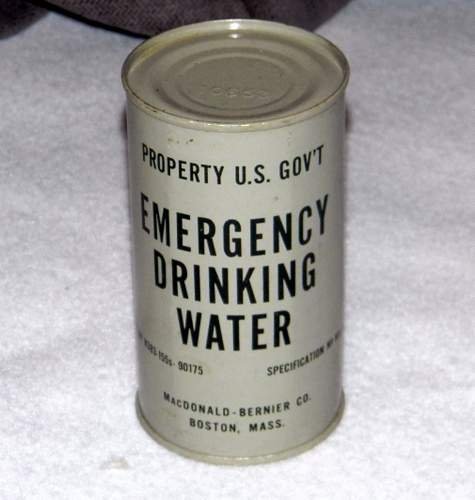 Vintage 1950's Government Iss. Emergency Drinking Water: Unopened. Full can of emergency drinking water by the MacDonald - Bernier Company of Boston Mass. Measures just under 5" tall and 2 5/8" in diameter.