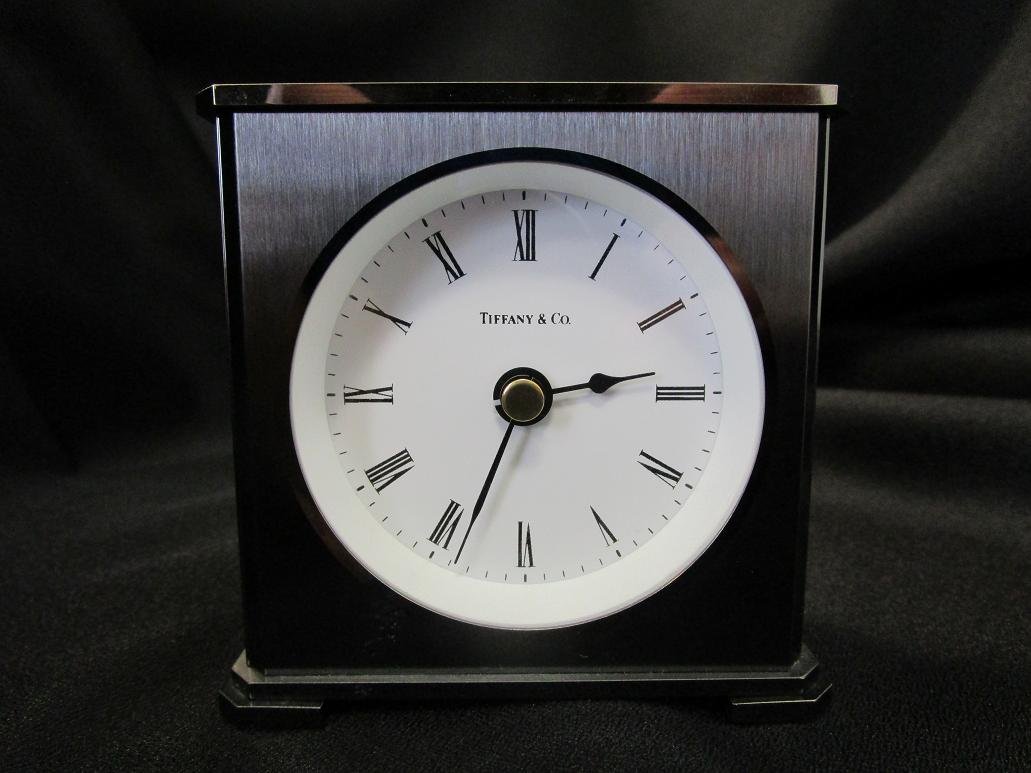 Tiffany & Co. Desk Clock: This authentic Tiffany clock has a pewter finish and stands 3" tall.