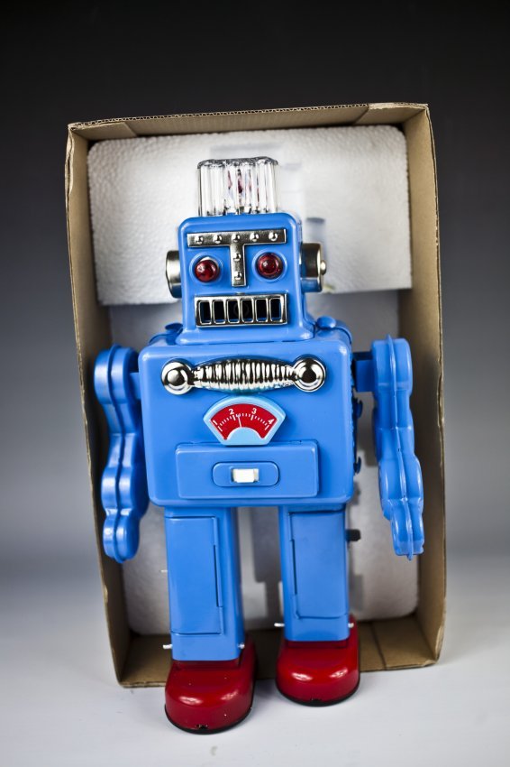 Tin Litho & Painted Battery Op. Smoking Robot.: Made in Japan by Yonezawa. Working. Has box. Toy (Good). Box (Very Good). Size 12" T.It's repro