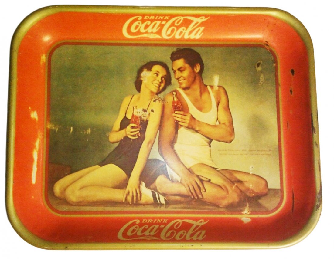 1934 Coca-Cola Serving Tray.: Some wear spots to face and rubs to rim.Condition (Very Good). Size 13 - 1/4" x 10 - 1/2".