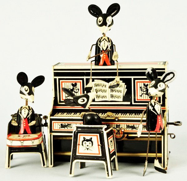 Tin Litho Marx Merrymakers Band Wind-Up Toy.: Description American. Working. Conductor version. Nice bright lithography with just slight wear to edge of piano top. Condition (Excellent). Size 9" x 8 - 1/4".