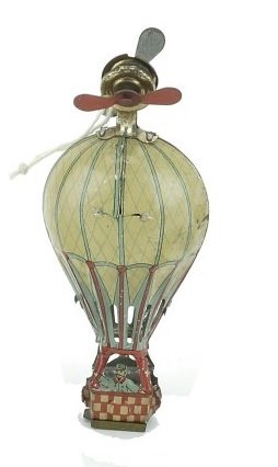 HOT AIR BALLOON PENNY TOY: Germany, Meier, lithographed tin, nice detail, very desirable, made to run on string with props rotating as the toy slides on string. 4 1/4" h