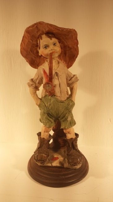 CAPODIMONTE BOY SMOKING A PIPE: This Capodimonte of a boy smoking a pipe. Great clear marking. The boy stands 10 1/2" tall and the base is 4 3/4" wide. Good condition. TOTAL WEIGHT: 856.5GRAMS