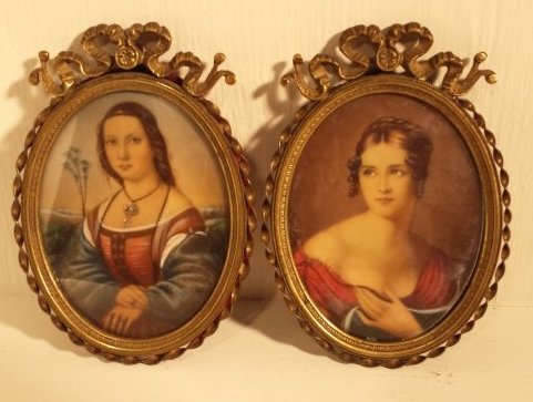 1920's PAIR OF ANTIQUE OIL PAINTINGS (SIGNED): This lot has a pair of antique oil paintings in frames from the 1920's or earlier. Both are of woman. Each frame is gold trim.1 w/ green velvet back and 1 w/ burgundy velvet back. Both picture frames 