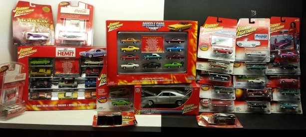 LOT OF JOHNNY LIGHTNING CAR COLLECTION.: For all you car collector enthusiasts. This is a fun and amazing collection. This Lot contains a total of 24 packages. 2 contain 10 cars in each. 21 individual packaged and 1 Large model car. They are