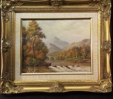 SIGNED OIL PAINTING ON CANVAS: This is a oil painting on canvas of a person fishing on a dock with woods all around them and a lake w/ mountains in background. Gold painted frame w/ brown tapestry matt. 13 1/4in.T. x 15 1/2in.W. Si