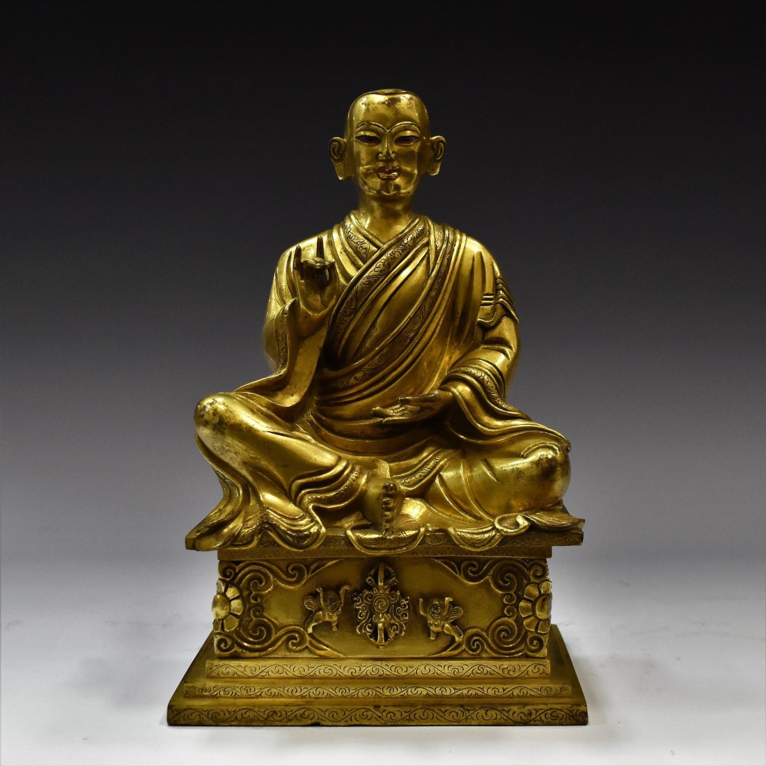 A CHINESE GILT BRONZE DROGMI LOTSAWA LAMA STATUE (1 of 12)