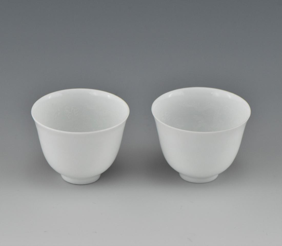 VERY FINE AND RARE PAIR TIAN MARK WINE CUPS: A VERY FINE AND RARE PAIR TIAN MARK WINE CUPS OF CHINESE MING DYNASTY ANHUA-TIAN Mark Porcelain Wine Cups, thinly fine potted, of inverted bell form, slightly flared to the rim, with raised on footed 