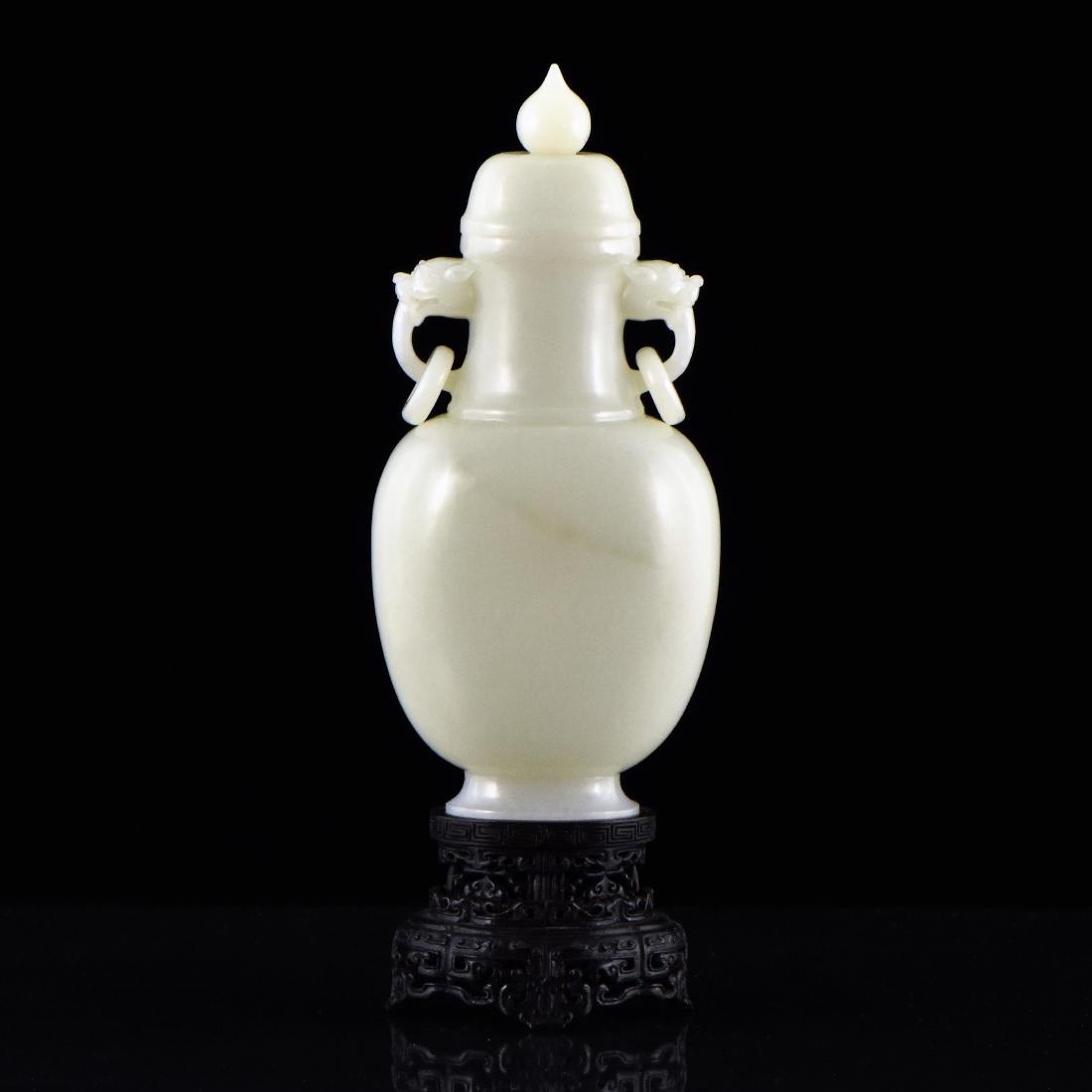 CARVED WHITE JADE OF COVERED URN WITH TIGER HANDLES (1 of 10)