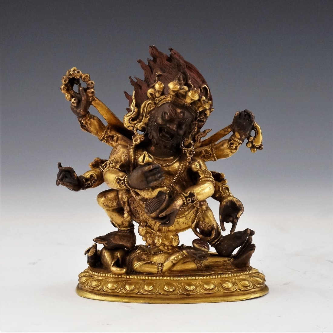 SINO-TIBETAN GILT BRONZE SIX ARMED MAHAKALA (1 of 12)
