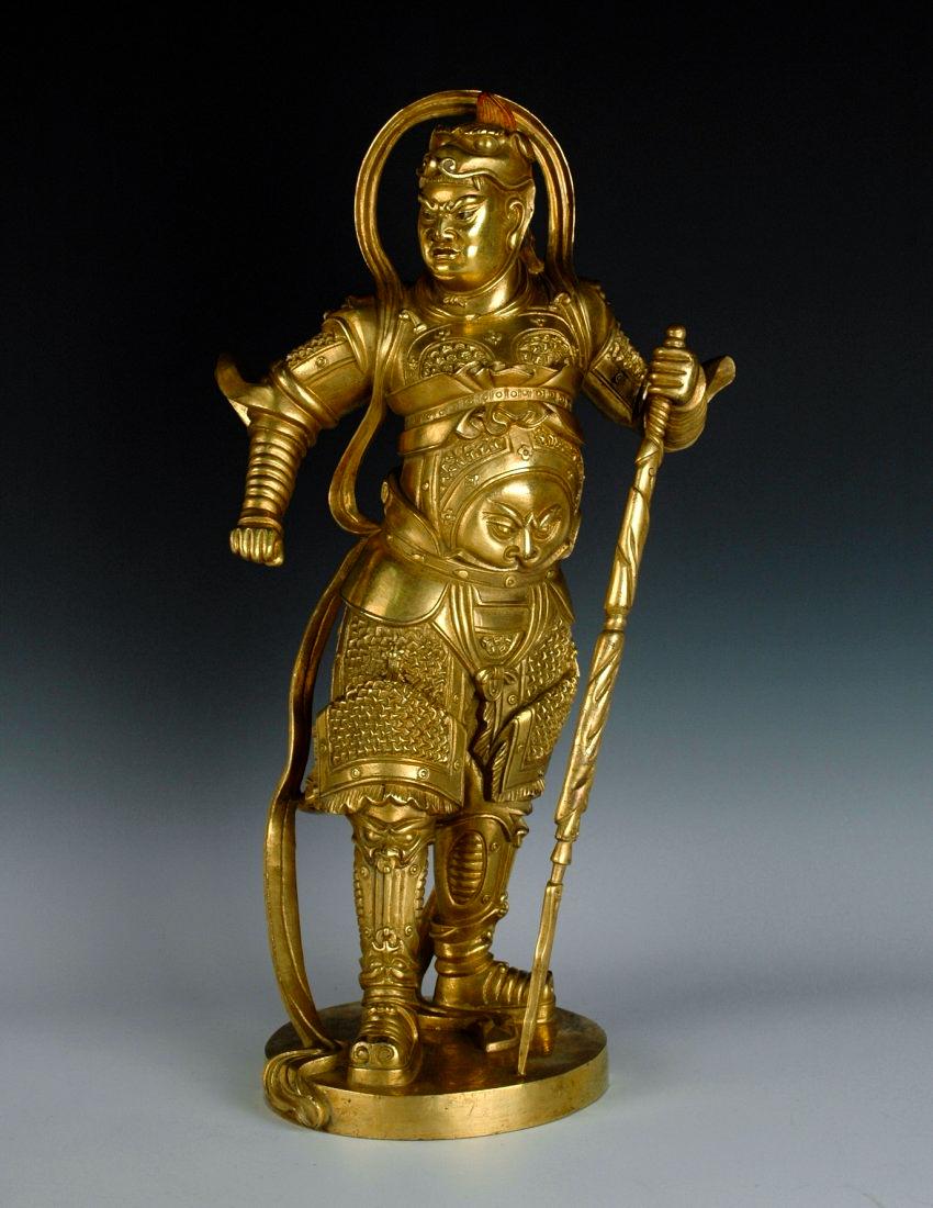 A GILT BRONZE IMMORTAL GUARDIAN FIGURE (1 of 8)