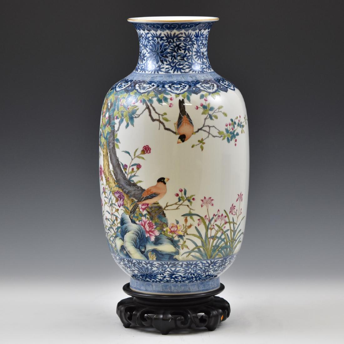 QING OPEN FACE BIRD & FLORAL PORCELAIN VASE: Chinese porcelain potted with tall cylindrical body, rounded shoulder gently tapered toward waisted prominent neck leading to flaring rim, raised upon potted base. The body hand painted in continuous