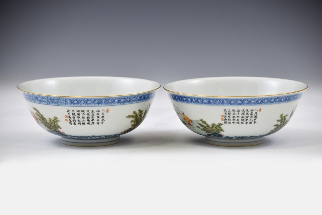 PAIR OF FAMILLE ROSE LANDSCAPE MOTIF BOWLS: Finely potted Chinese porcelain in deep vessel form, with rounded cavetto gracefully rising a steep sides toward wide gallery mouth, raised upon a ring footed base. The exterior decorated with delicat