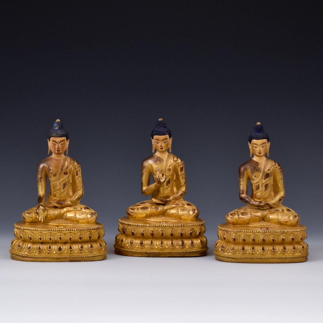 SET OF 3 GILT BRONZE SHAKYAMUNI BUDDHAS (1 of 12)