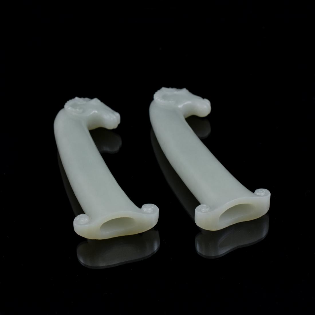 PAIR OF WHITE JADE KNIFE HILTS IN SHEEP MOTIF (1 of 9)