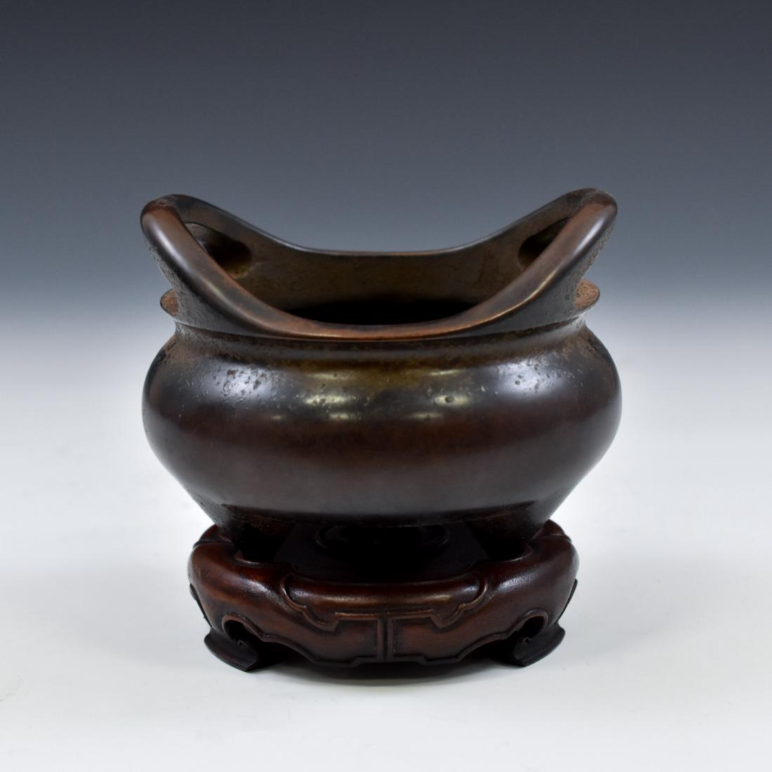 MING BRONZE TRIPOD CENSER IN INGOT SHAPED RIM ON STAND (1 of 9)