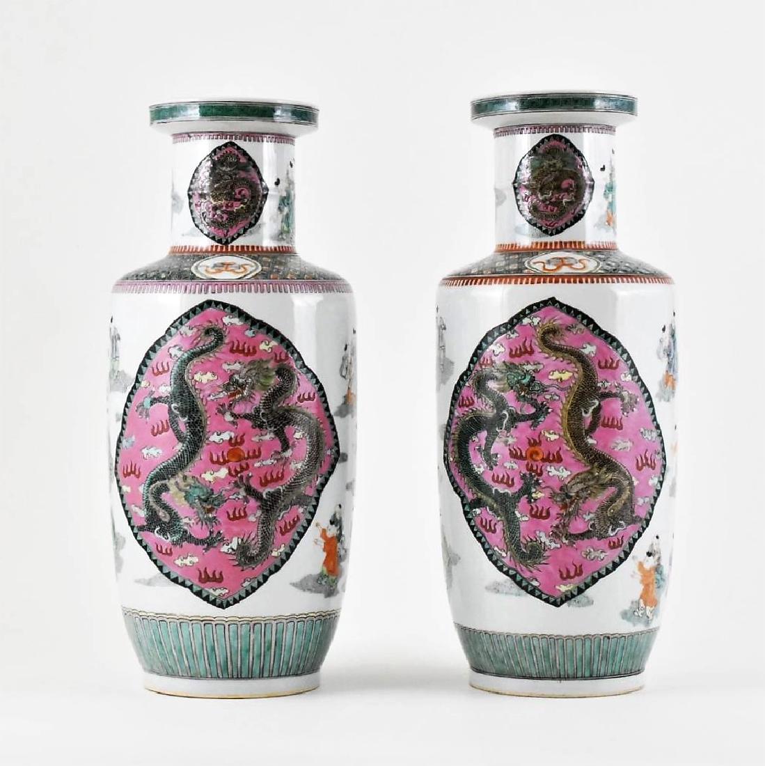 PAIR OF FAMILLE ROSE DRAGON VASES, CHENGHUA MARK: The pair vases having a baluster shaped body, Bangqiuping. Of tall cylindrical belly, slightly narrowed to the flat concave base, with angled shoulder surmounted straight prominent neck further to fla