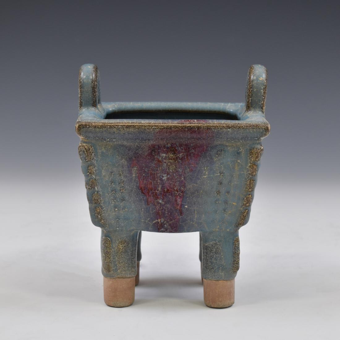 CHINESE JUN TYPE FANGDING PORCELAIN CENSER: Spectacular Chinese Lu-Jun Glaze Fangding porcelain censer. A rectangular body supported by stout legs with horse-shoe shaped handles. Opaque turquoise-blue glaze submersed overall with a finely mottl